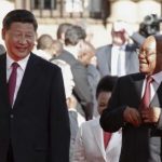 chinese-president-xi-jinping-walks-with-south-african-president-jacob-zuma-upon-his-arrival-at-the-union-buildings-in-pretoria